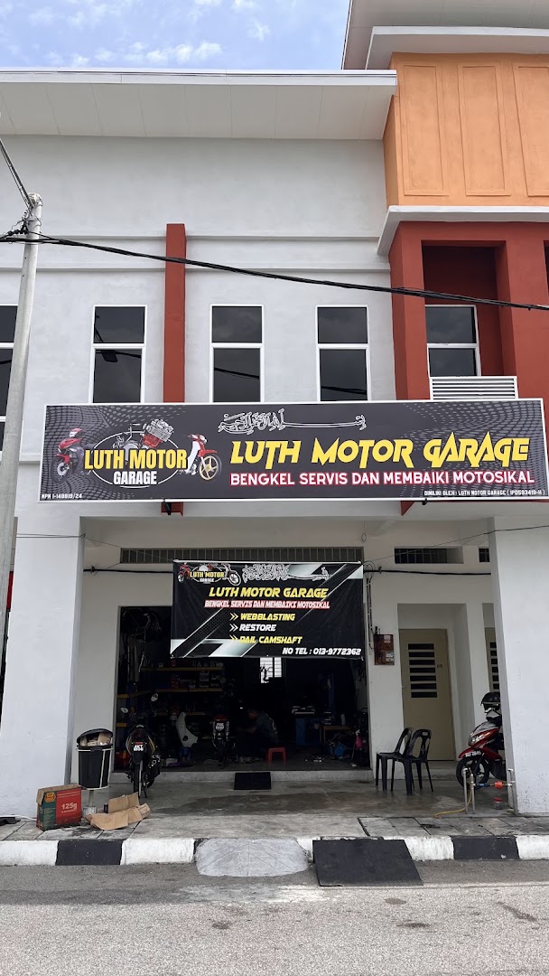 LUTH MOTOR GARAGE — photo 3